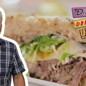 Guy Fieri Eats a Dynamite Short Rib Sandwich | Diners, Drive-Ins and Dives | Food Network