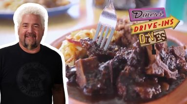 Guy Fieri Eats Oxtail Stew | Diners, Drive-Ins and Dives | Food Network