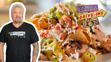 Guy Tries Highland Nachos with Carnitas at a Ski Resort | Diners, Drive-Ins and Dives | Food Network