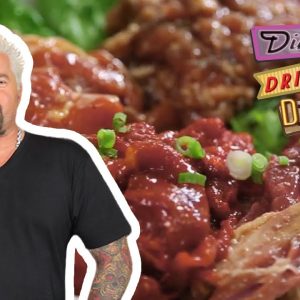 Guy Fieri Eats All-You-Can-Eat Korean BBQ | Diners, Drive-Ins and Dives | Food Network