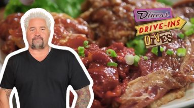 Guy Fieri Eats All-You-Can-Eat Korean BBQ | Diners, Drive-Ins and Dives | Food Network