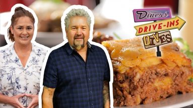 Guy Fieri and Antonia Lofaso Eat Pastellón de Amarillo | Diners, Drive-Ins and Dives | Food Network