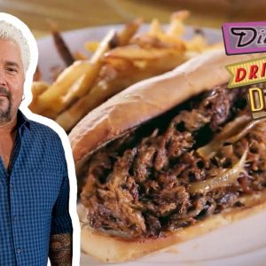 Guy Fieri Eats the Three-Meat Octavian Sandwich | Diners, Drive-Ins and Dives | Food Network
