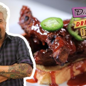 Guy Fieri Eats BBQ Smoked Alligator Ribs | Diners, Drive-Ins and Dives | Food Network