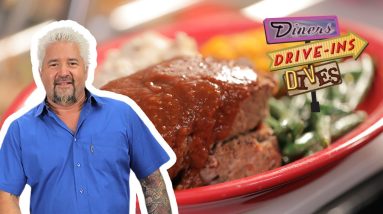 Guy Fieri Eats a MASSIVE Plate of BBQ Meatloaf | Diners, Drive-Ins and Dives | Food Network