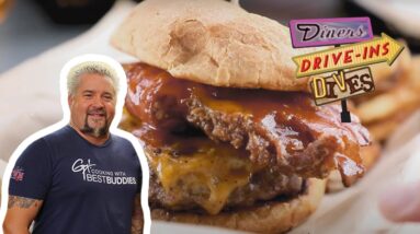 Guy Fieri Eats a Barnyard Burger with ALL the Meats | Diners, Drive-Ins and Dives | Food Network
