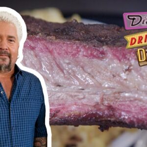 Guy Fieri Eats Righteous Wings & MASSIVE Beef Ribs | Diners, Drive-Ins and Dives | Food Network