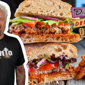 Guy Eats a Lamb Burger at Car Wash-Meets-Laundromat | Diners, Drive-Ins and Dives | Food Network