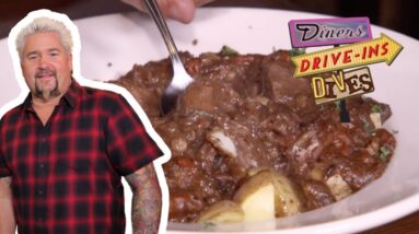 Guy Fieri Eats Irish Guinness Stew in Atlantic Beach | Diners, Drive-Ins and Dives | Food Network