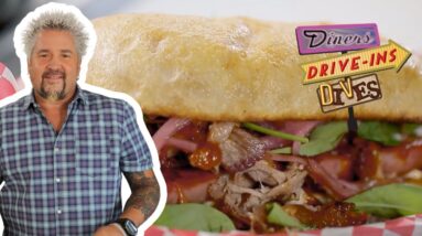 Guy Fieri Takes Down the 'Porkcules' Sandwich | Diners, Drive-Ins and Dives | Food Network