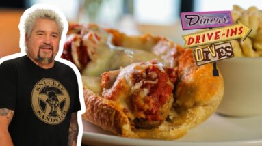 Guy Fieri Eats a Gigantic Meatball Sub in Alaska | Diners, Drive-Ins and Dives | Food Network